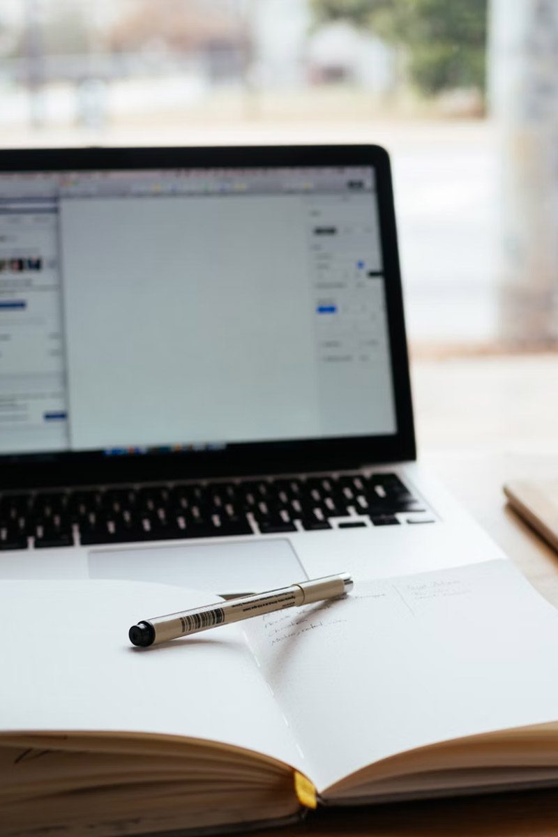 Content Creation photo of a computer and writing abou tto occur